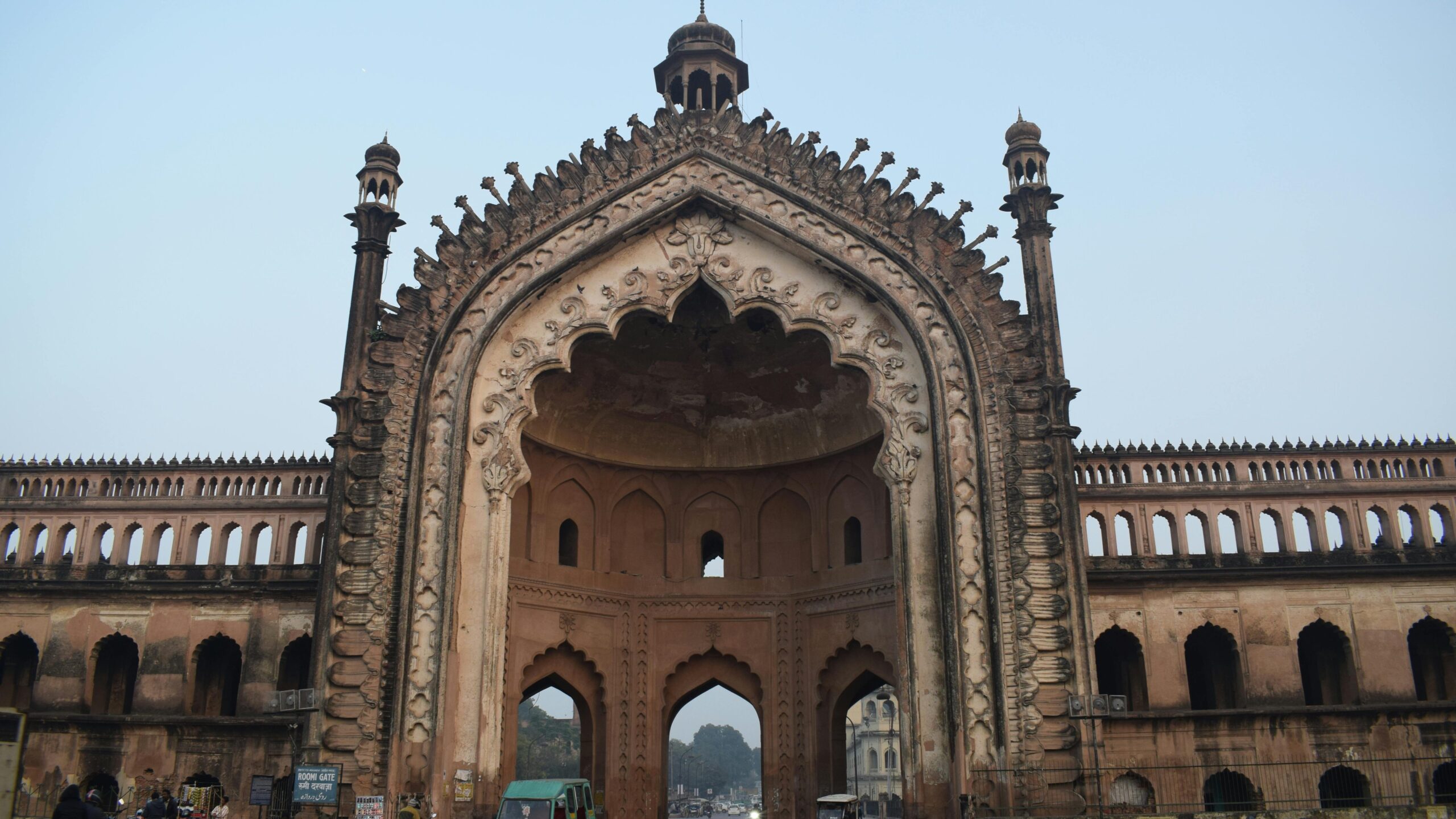 Capture of the majestic Rumi Darwaza in Lucknow, India, showcasing its intricate architecture at twilight.